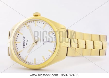 Le Locle, Switzerland 15.01.2020 - Tissot Woman Watch Stainless Steel Case, Gold Pvd Coating White C