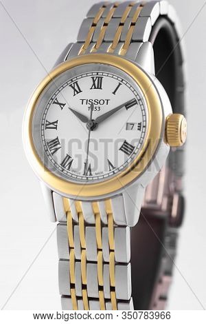 Le Locle, Switzerland 15.01.2020 - Tissot Woman Watch Stainless Steel Case, Gold Pvd Coating White C