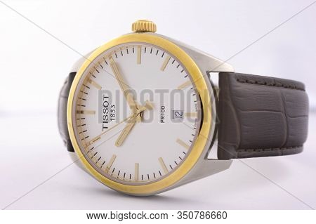 Le Locle, Switzerland 15.01.2020 - Tissot Woman Watch Stainless Steel Case, Gold Pvd Coating White C