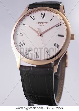 Le Locle, Switzerland 15.01.2020 - Tissot Man Watch Stainless Steel Case, Gold Pvd Coating White Clo