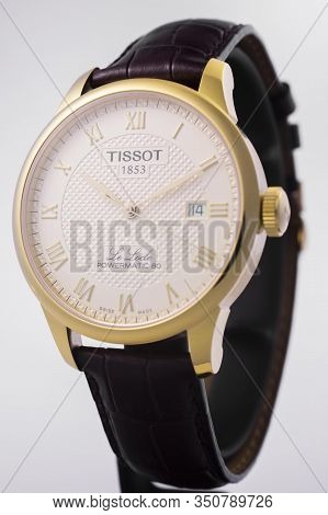 Le Locle, Switzerland 15.01.2020 - Tissot Man Watch Stainless Steel Case, Gold Pvd Coating White Clo