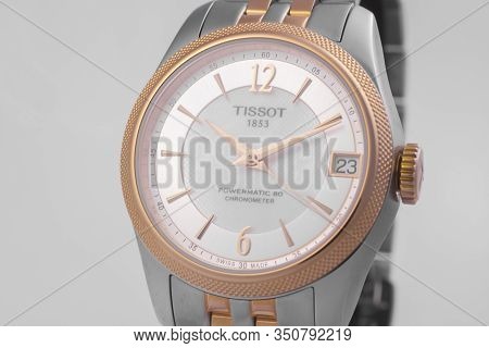 Le Locle, Switzerland 15.01.2020 - Tissot Woman Watch Stainless Steel Case, Gold Pvd Coating White C