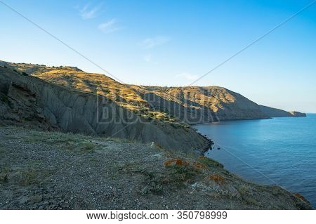 Beautiful Scenic Landscape At Cape Meganom And On Far Background At Top Wind Farm On Black Sea In Su