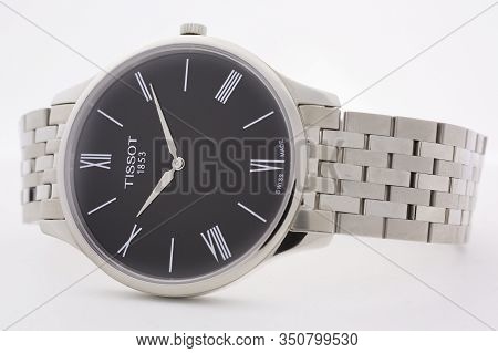 Le Locle, Switzerland 15.01.2020 - Tissot Woman Watch Stainless Steel Case, Black Clock Face Dial, M