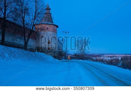 Guard Tower Of Zaraisk Kremlin With Way Road And Residential Houses On Background On Blue Hour In Wi
