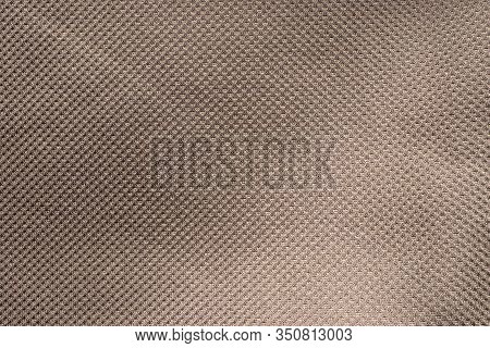 Durable Waterproof Fabric. Ripstop Fabric. Close-up Brown Ripstop Material Texture And Background.