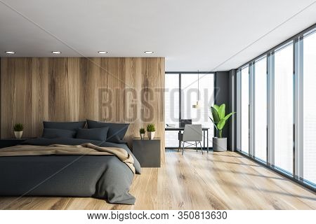 Interior Of Panoramic Master Bedroom With Grey And Wooden Walls, King Size Bed With Gray And Beige B