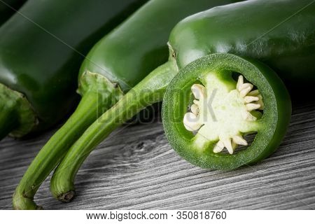 Jalapeno Pepper Slice. Round Single Vegetable Cross Section With Seeds. Hot Spices Food Background. 