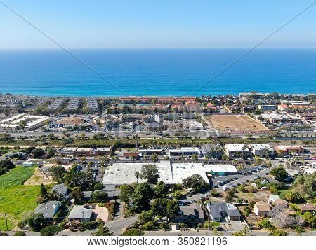 Aerial View Of Typical South California Community Condo With Tennis Court And Pool Next To The Sea O