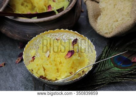 Sweet Rice Or Zarda Pulao On A Grey Background With Copy Space.