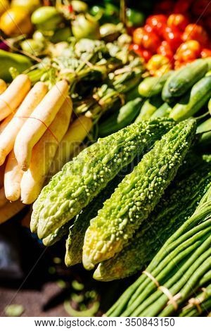 Fresh organic vegetables in outdoor asian market