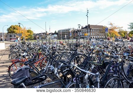 Venlo, Limburg, Netherlands - October 13, 2018: Rows Of Parked Bicycles In The Dutch City Close To T