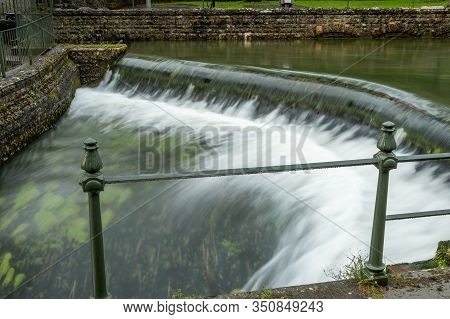Long Exposure Of A Waterfall In Cheddar Village In Somerset