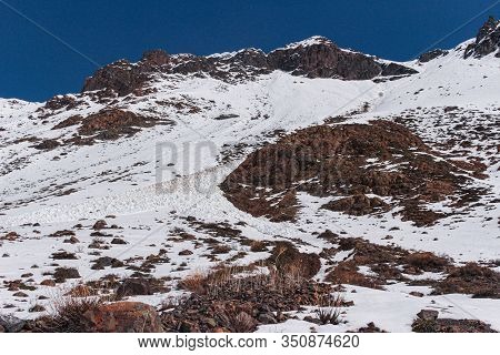 Natural Monument El Morado, Central Andes Of Chile. Beautiful Landscape Of Snowy Rocky Mountain.