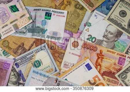 Multicurrency Background Of Euros Us Dollars, Russian Rubles, Egyptian Pounds And Ukrainian Hryvnias