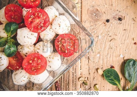 Mozzarella Cheese Balls With Tomato And Basil