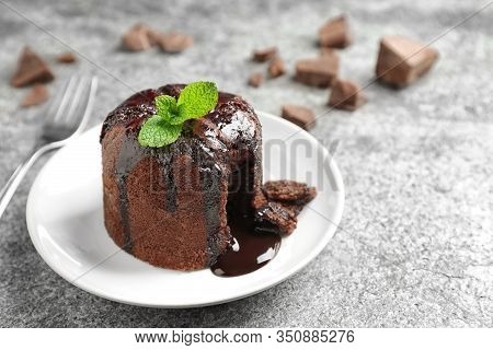 Delicious Warm Chocolate Lava Cake On Grey Table