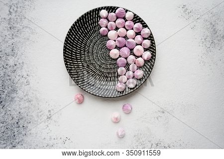 Pink Meringue Dessert On A White Background