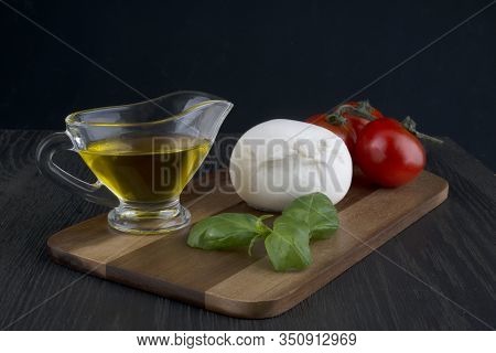 Fresh Tomato, Mozzarella, Basil And Olive Oil Close Up