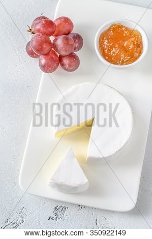Camembert With Glass Of White Wine Flat Lay