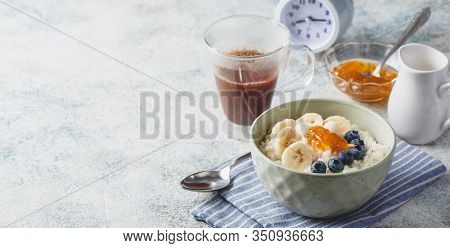 Breakfast With Milk Rice Porridge With Banans And Blueberry, Creamy Rice Pudding Or French Riz Au La
