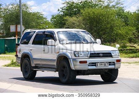 Maun, Botswana - February 9, 2020: White Offroad Car Toyota 4runner In The Town Street.