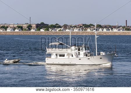 Fairhaven, Massachusetts, Usa - July 31, 2019: Motor Trawler Nobska Light Glowing In Morning Sun As 