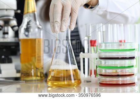Oil Sample, Chemical Experience In Laboratory. Test Tubes And Trial Amount Oil Are On Table. Experim