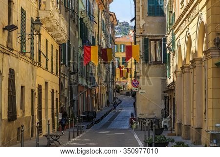 Ventimiglia, Italy - April 22, 2016: Colorful Old Buildings On The Narrow Streets Of A Medieval Town