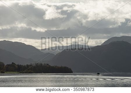 Epic Autumn Fall Landscape Of Ullswater And Surrounding Mountains And Hills Viewed From Hallin Fell 