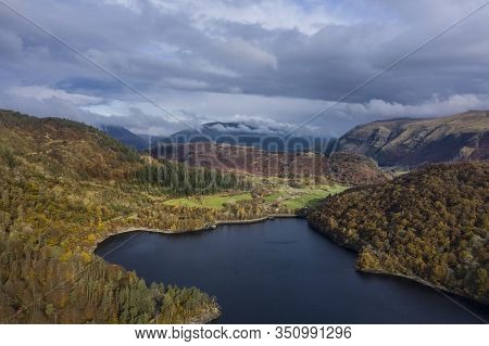 Beautiful Aerial Drone Landscape Image Of Glorious Autumn Fall Sun Over Thirlmere In Lake District