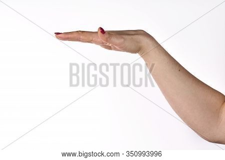 European Young Female Showing Something Size With Hands.