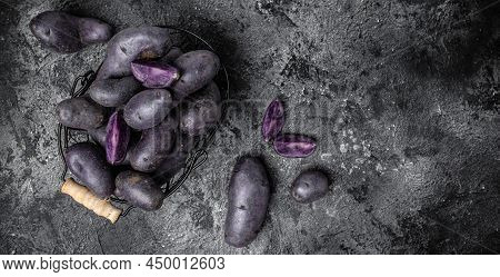 Organic Purple Sweet Potato. Raw Sweet Potatoes Or Batatas. Pomoea Batatas. Batata Potato. Vegan Foo