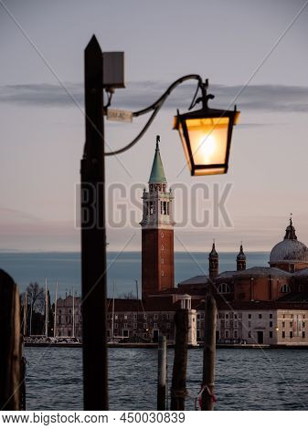 Campanile Bell Tower Of San Giorgio Maggiore Church And Lantern At Dusk In The Evening