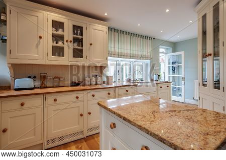 Cavendish, Suffolk - Jan 19 2019: Typical Modern Bedroom With Slatted Wooden Bed And Sidetables With
