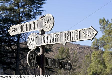 Old Direction Road Sign In The Town Of Nieu-bathesda South Africa