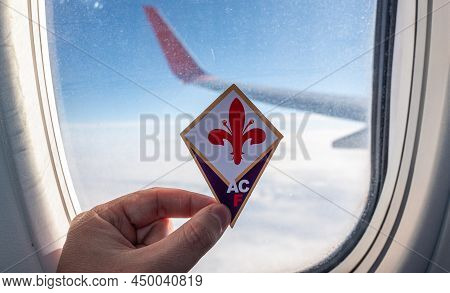 December 6, 2021. Florence, Italy. The Emblem Of The Football Club Acf Fiorentina On The Background 
