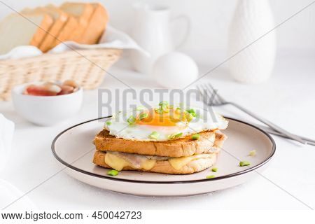 Homemade Sandwich - Croque Madame On A Plate On A Light Table