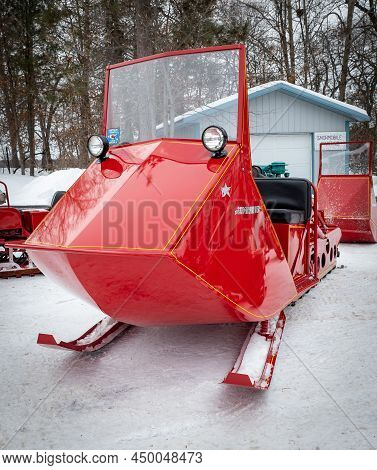 Nisswa, Mn - 5 Jan 2022: Antique Polaris Sno-traveler Snowmobile.