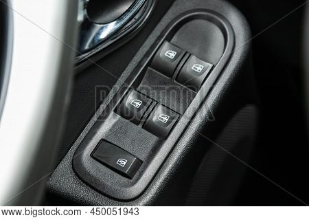 Novosibirsk, Russia -  February  10, 2022: Nissan Terrano, Car Door Interior Armrest With Window Con