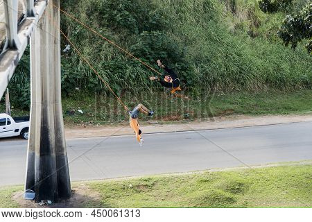 Rappel Practitioner Doing Extreme And Dangerous Marbalisms. Salvador Bahia Brazil.