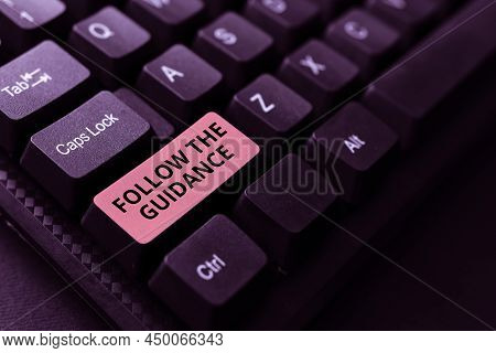 Sign Displaying Follow The Guidance. Concept Meaning Controlling A Course Of Projectile By Builtin M