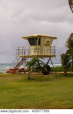 Lifeguard Tower Under A Cloudy Sky On The Windy Lydgate Beach On Kauai