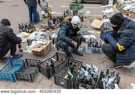 War In Ukraine. Kyiv Territorial Defense Making Molotov Cocktails