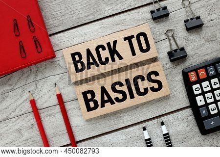 Text On Wooden Blocks. Red Notepad And Calculator. Business Concept