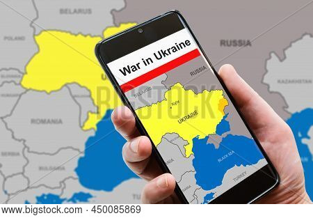 War In Ukraine On Mobile Phone Screen. Ukraine And Russia Borders With Donbass On Europe Map. Ukrain
