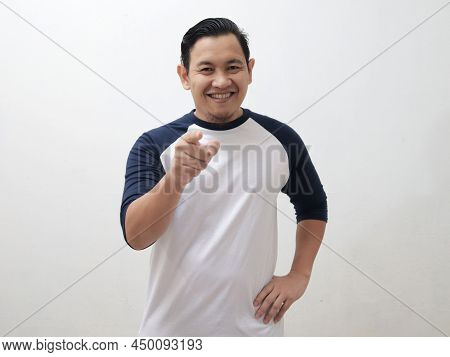 Happy Excieted Asian Man Smiling And Pointing To Camera, Hiring Or Choosing You Concept