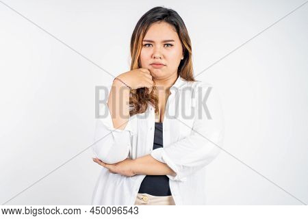 Sad Portrait Of Young Asian Woman Over Isolated Background
