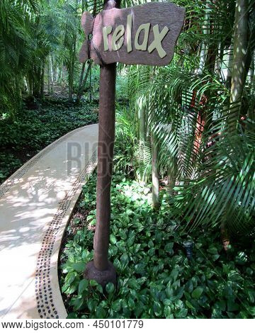 Tropical Resort Relax Sign, Playa Del Carmen, Yucatan Peninsula`s Riviera Maya, Mexico.