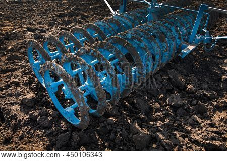 Belogorye, Khmelnytsky Region, Ukraine - August 19, 2021: Harrow On A Background Of Plowed Soil Prep